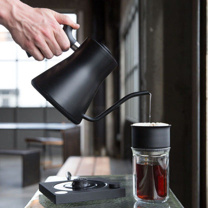 fellow kettle black pouring out