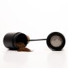 Varia hand grinder with coffee powder